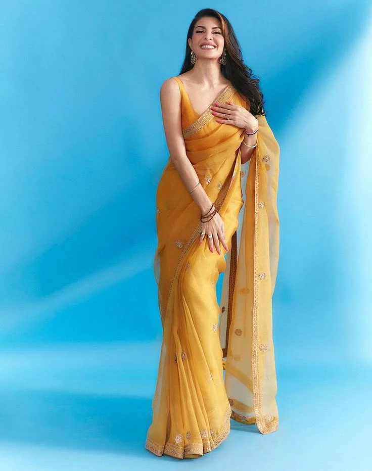 Madhuri Jacqueline and Chitrangda in beautiful yellow sarees