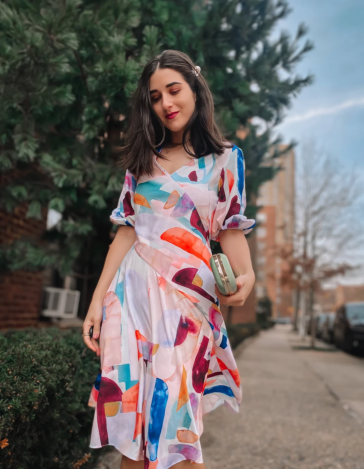 EstherSanterNYCStreetStyleFashionBloggerOutfitOOTDSpring2021RobertGrahamOliviaDressStyledSummerPrettyBeautifulWatercolorPrintColorfulFunHairClipTripodPhotographyClutchWhatToWearBuy
