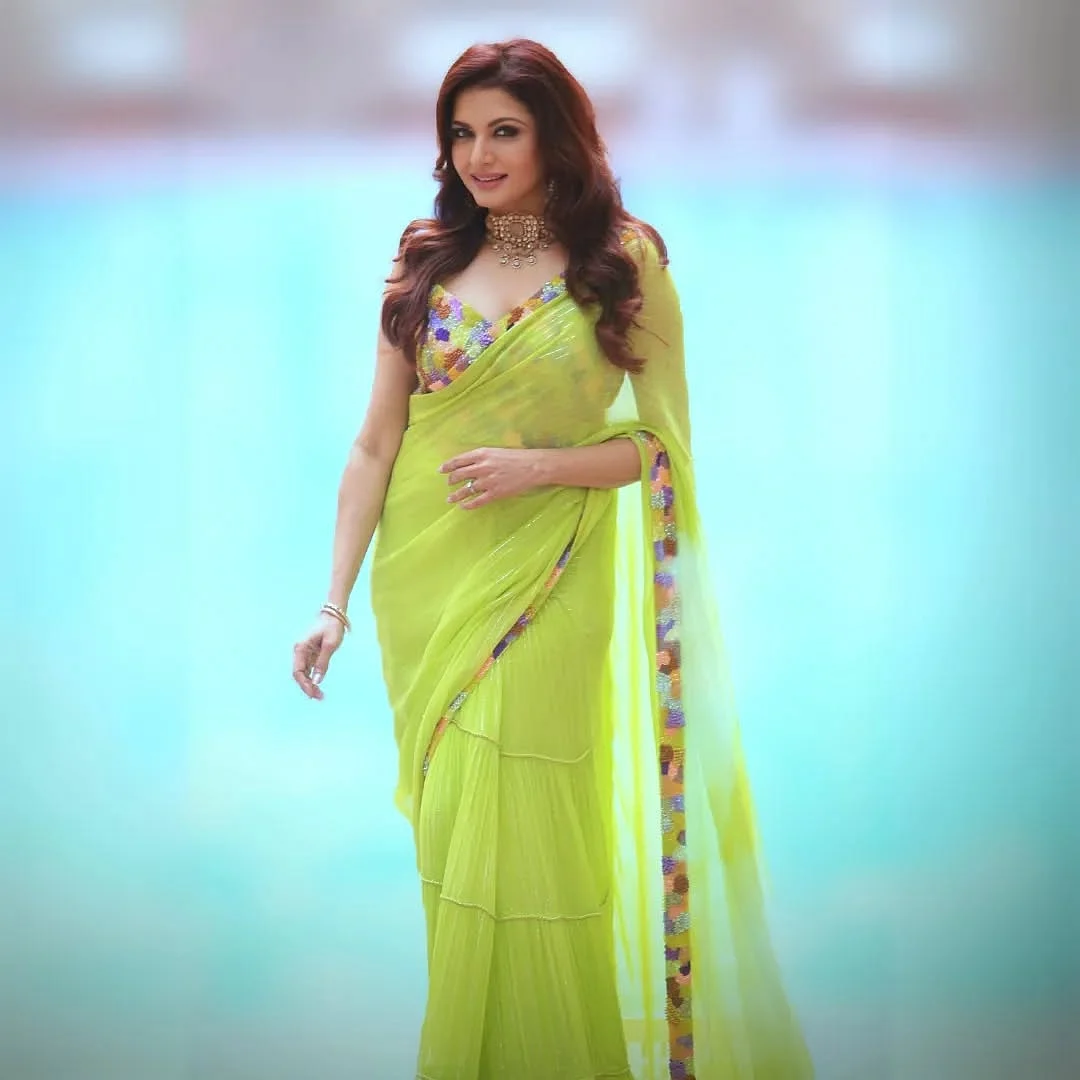 Bold beautiful and breathtaking bhagyashree online stuns in our Neon Hand Embroidered Blouse and