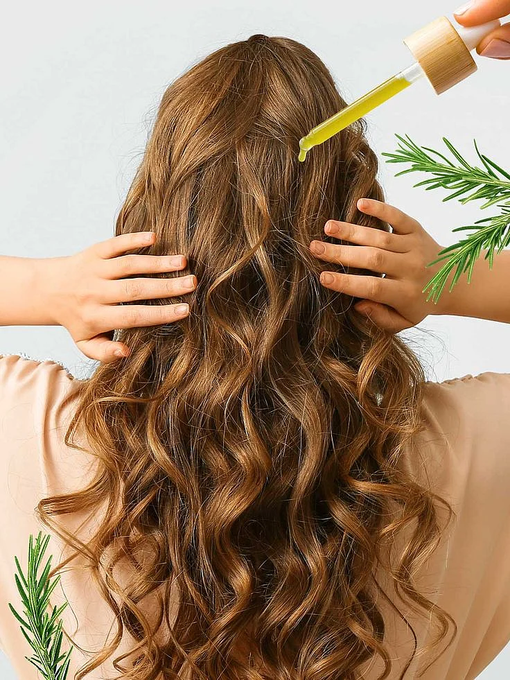applying oil to the hair 3