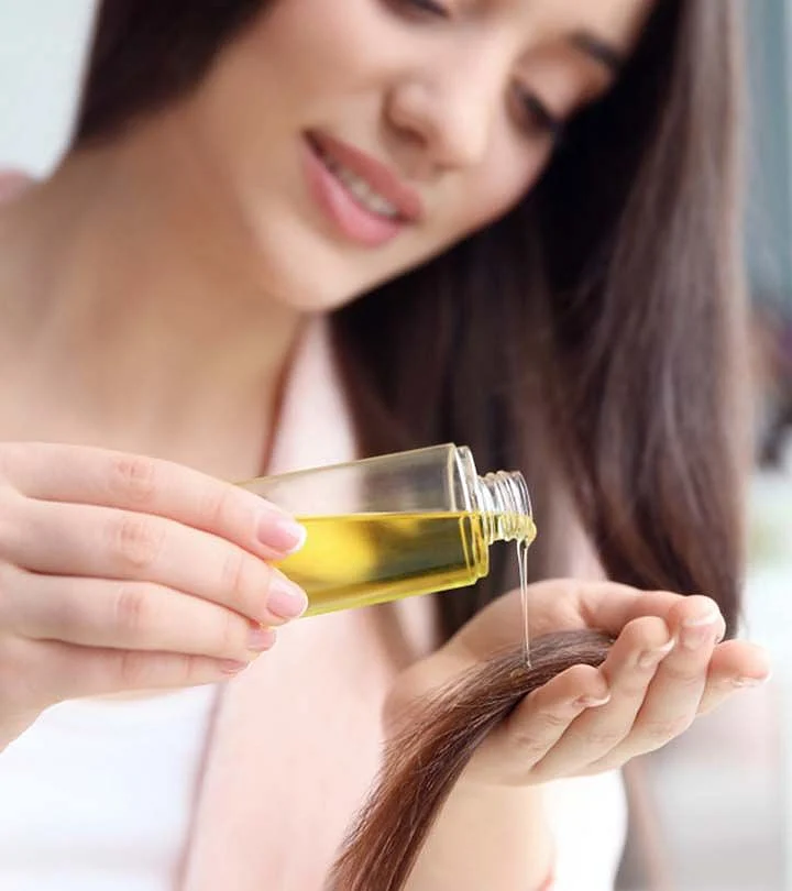 applying oil to the hair