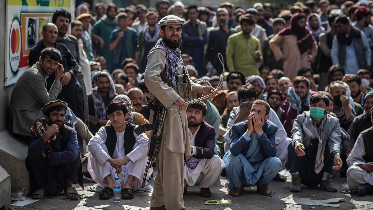 افغانستان میں سرعام سزا دینے کا منظر / Getty Images