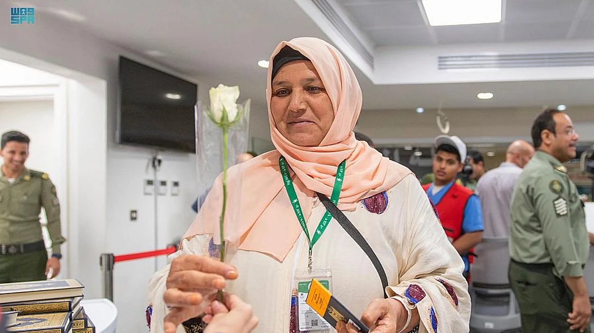 حاجة عراقية خلال مغادرتها المنفذ بعد أدائها فريضة الحج