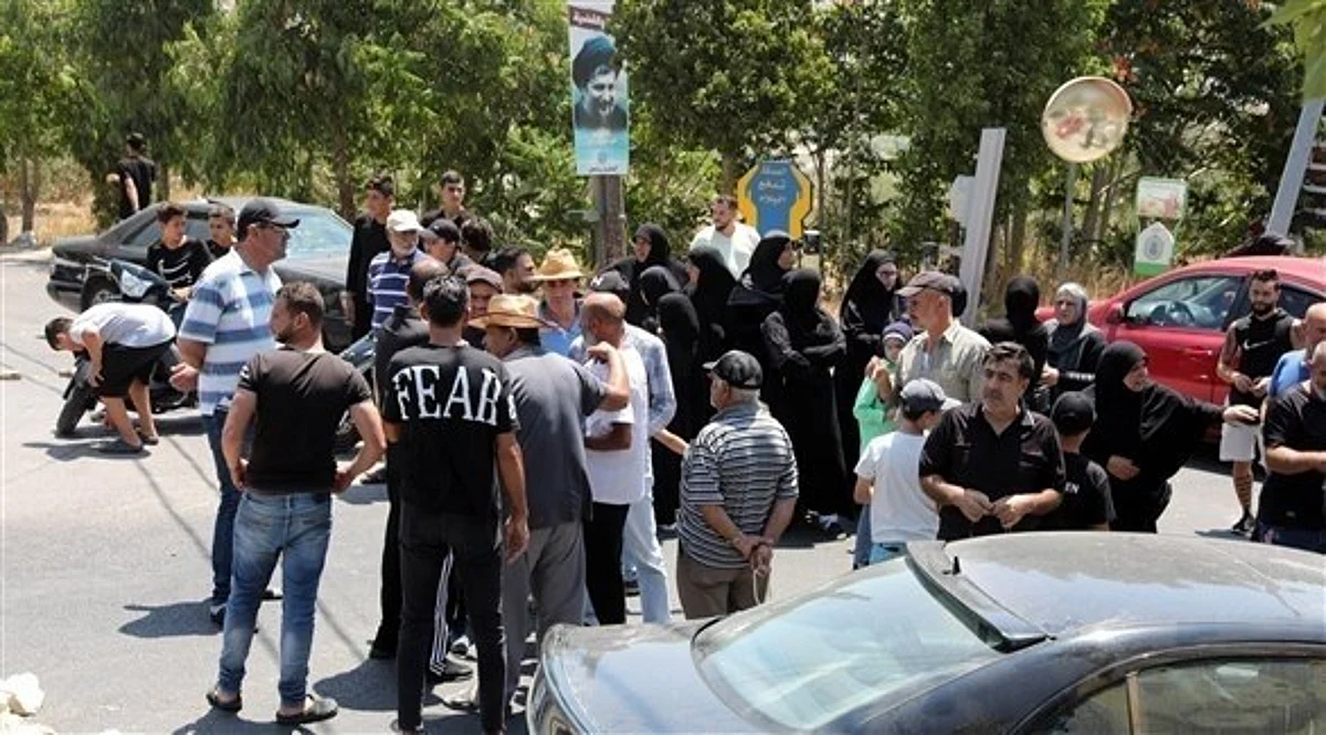 تهديد بالقتل.. "حزب الله" يعتدي على مصور نقل معاناة أهل جنوب لبنان