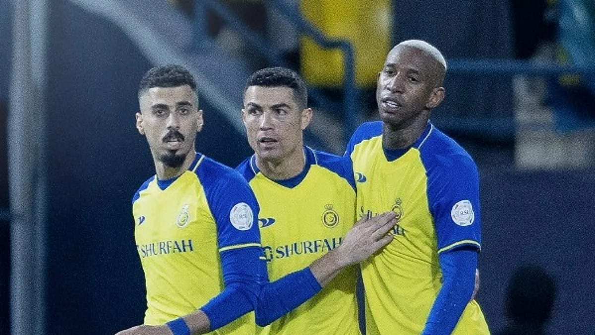 فرحة لاعبي النصر بتسجيل هدف في مرمى الاتفاق