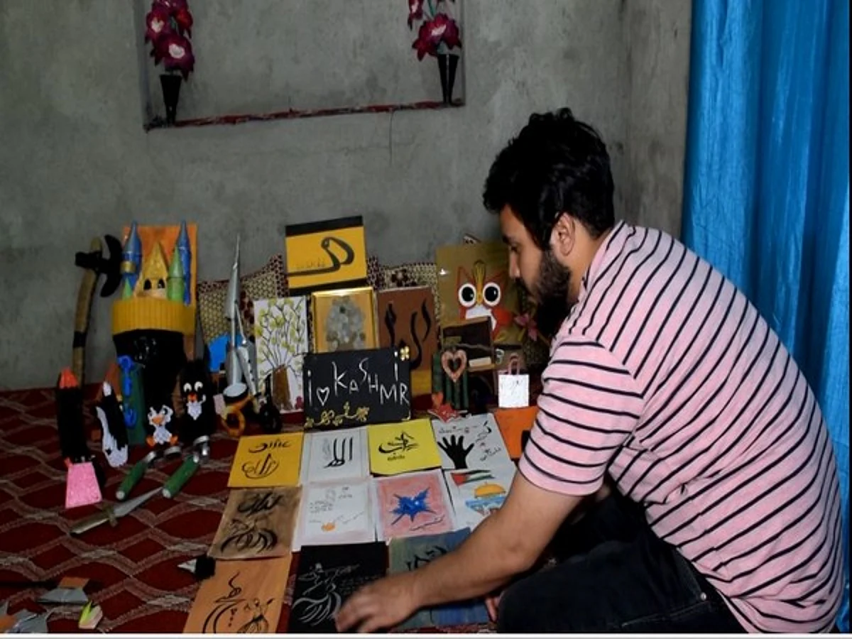 Youth from J-K’s Pulwama enters India Book of Records with smallest origami paper flower creation