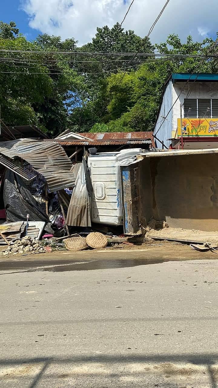 Dump truck hits store, water pipe in road accident in Cebu City barangay - Vimarsana News
