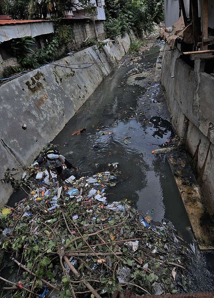 Clogged Rivers DENR orders cleanup of 12 rivers in Central Visayas