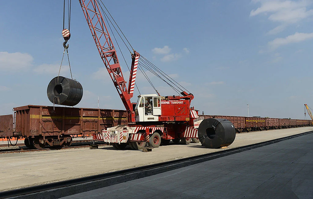 Freight unloading at a terminal near Ahmedabad (SAM PANTHAKY/AFP/Getty Images)
