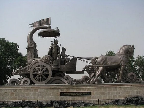 Discourse of Krishna and Arjuna in <a href="https://en.wikipedia.org/wiki/Kurukshetra">Kurukshetra</a>