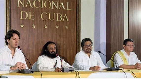 Sri Sri Ravi Shankar with FARC leaders: Photo credit: Art of Living 