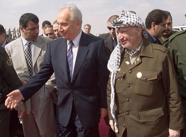 Shimon Peres and
Yasser Arafat