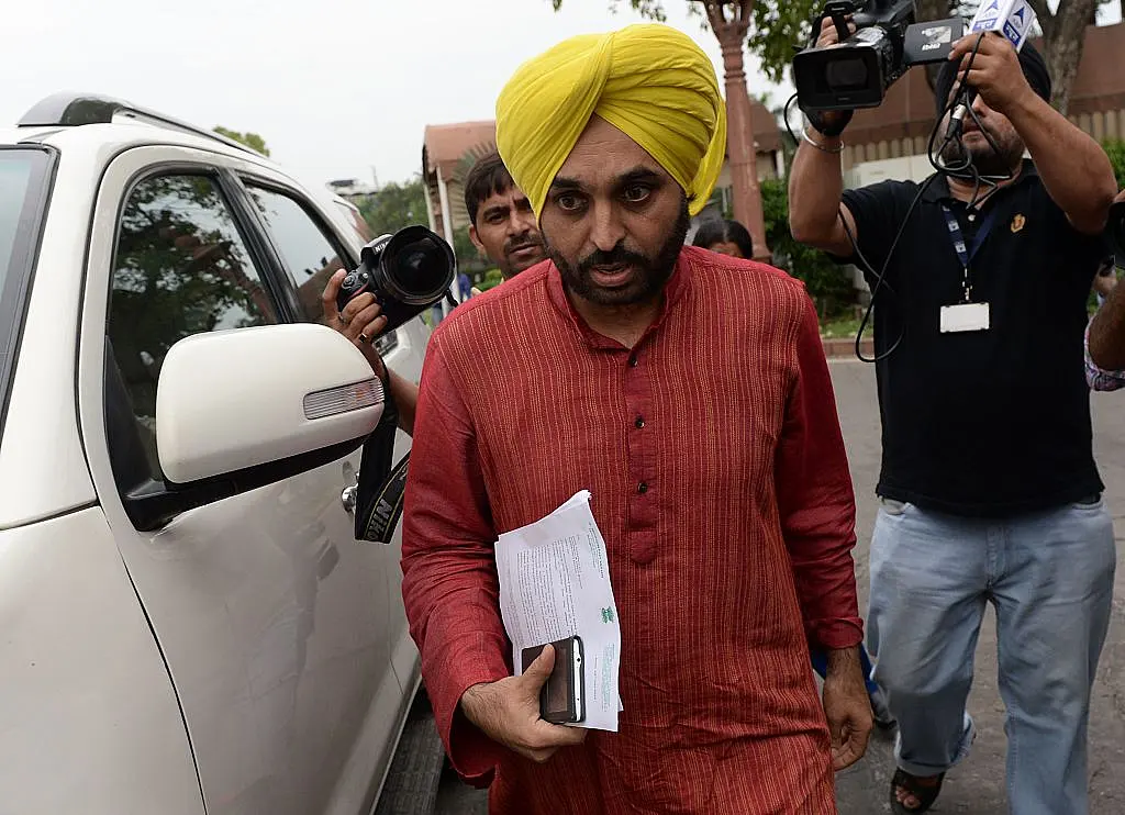 AAP’s Infamous MP Bhagwant Mann Pitted Against Sukhbir Singh Badal In Punjab Elections