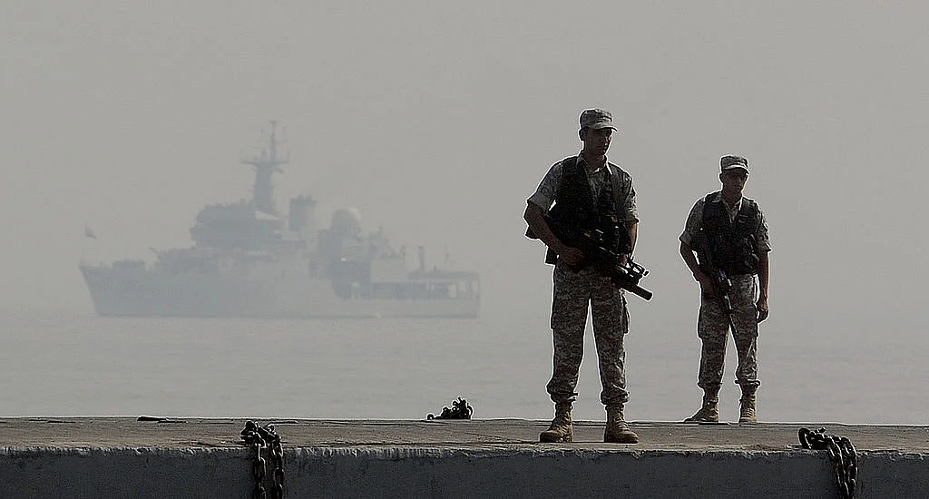 Indian Navy’s commandos stand guard during a the Fleet Review in Mumbai on December 20, 2011. (PUNIT PARANJPE/AFP/Getty Images)
