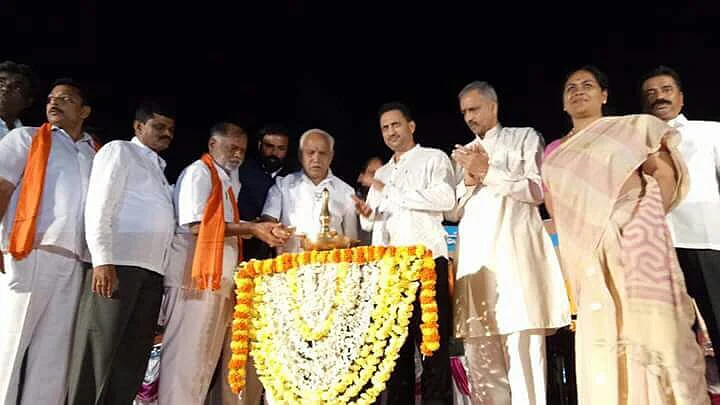 Yeddyurappa lighting a lamp before addressing the Bhatkal rally.