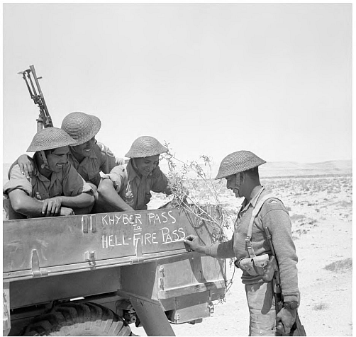 Soldiers of the Fourth Indian Division decorate the side of their lorry with the words: “From Khyber Pass to Hellfire Pass”. Hellfire Pass was the nickname for the strategic Al-Halfaaya Pass in Egypt which the Indians tried to wrest from the Germans.