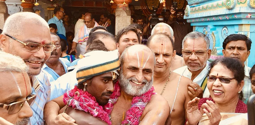Archaka Rangarajan embraces Aditya Parsari.