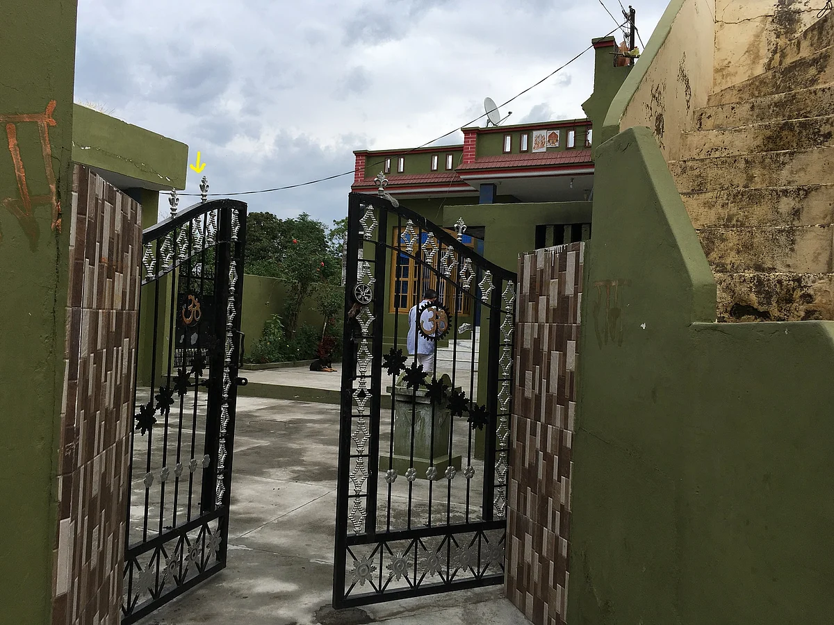 Entry to Sanji Ram’s house. The yellow mark points to another gate that leads to Devasthan. This courtyard serves as a shortcut to the prayer hall for villagers.