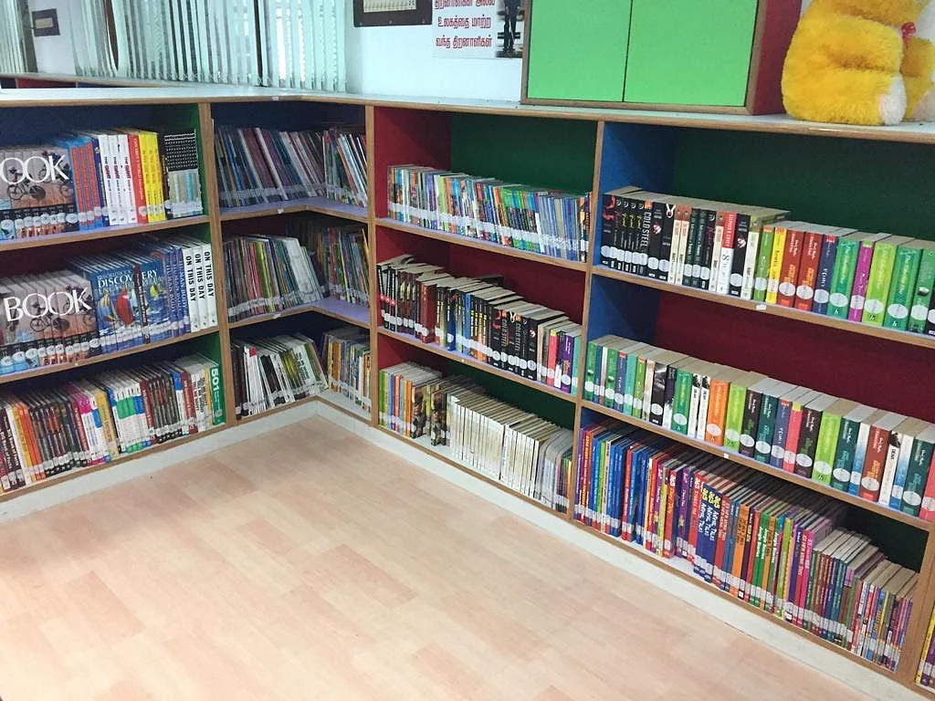 Books for differently-abled children sit on low-built shelves 