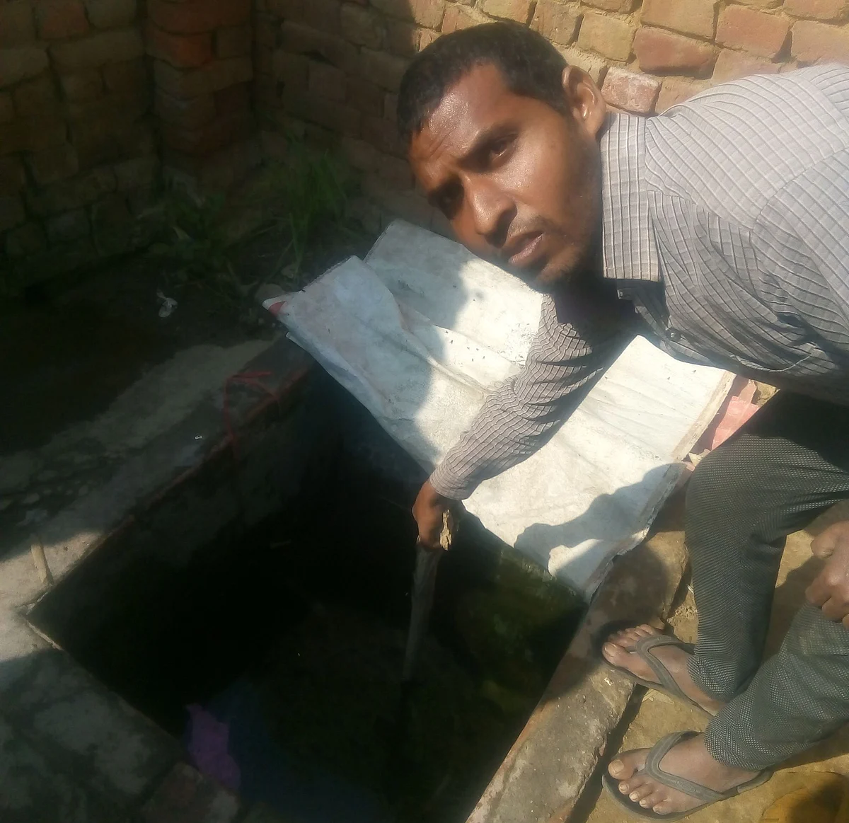 Yogendra showing the cement tank (<i>Swarajya</i>)