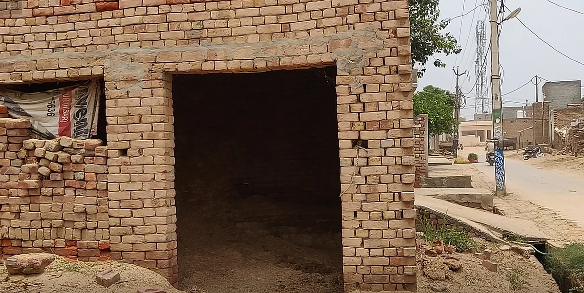 The family’s cattle shed that is now empty.