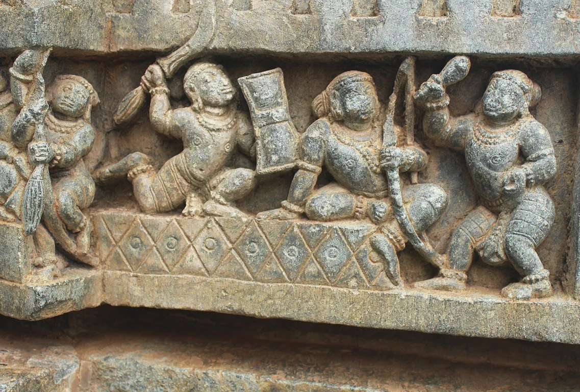 The ritual bow kept by Kamsa taken and broken by Shri Krishna.
