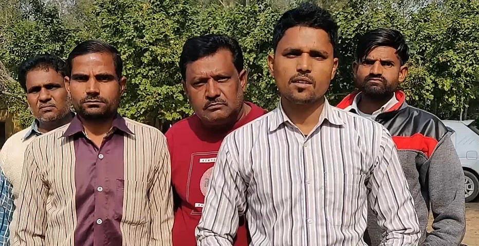 Lokesh’s cousins and neighbours. In striped white shirt is Mukesh