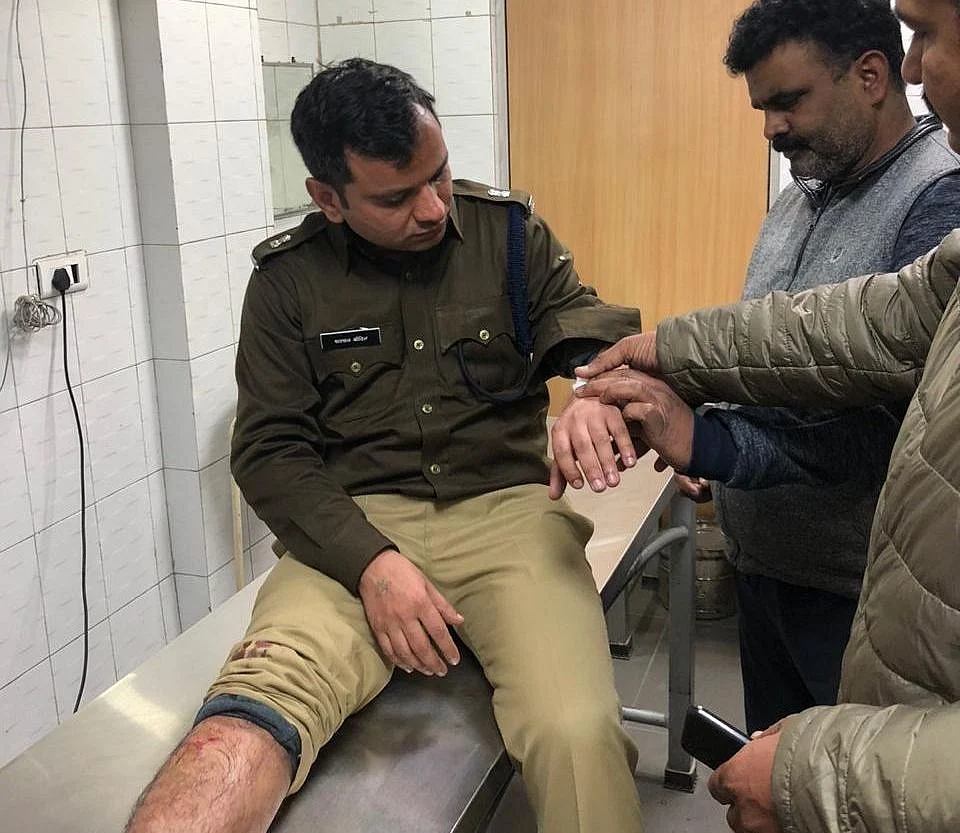 Muzaffarnagar SP Satpal Antil receiving treatment for pellet injuries.