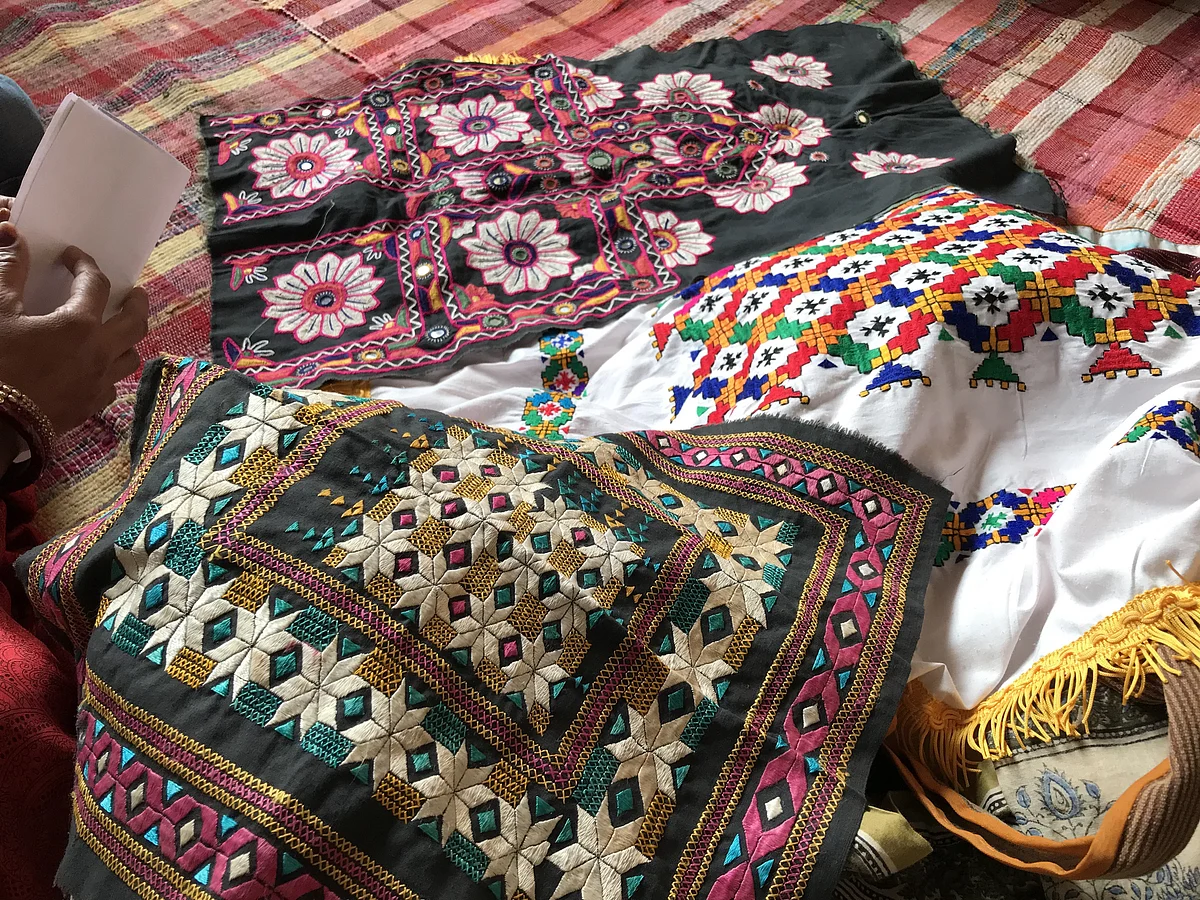 Women skilled in embroidery and thread work.