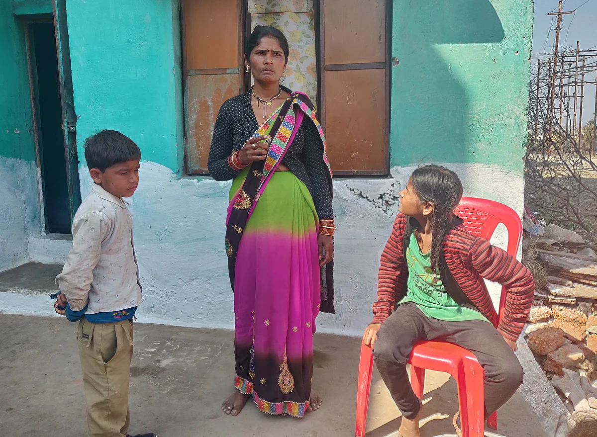 Janaki, centre, with Dhan Prasad’s nephews at his house on 28 January. (Swati Goel Sharma/Swarajya Magazine)