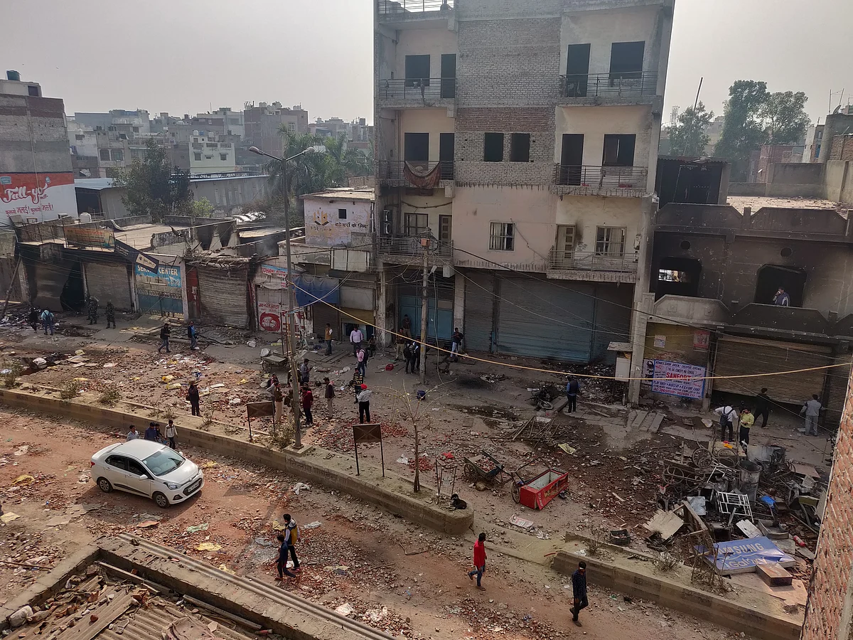 A view of the building of Tahir Hussain (tallest in the picture) from Moonga Nagar