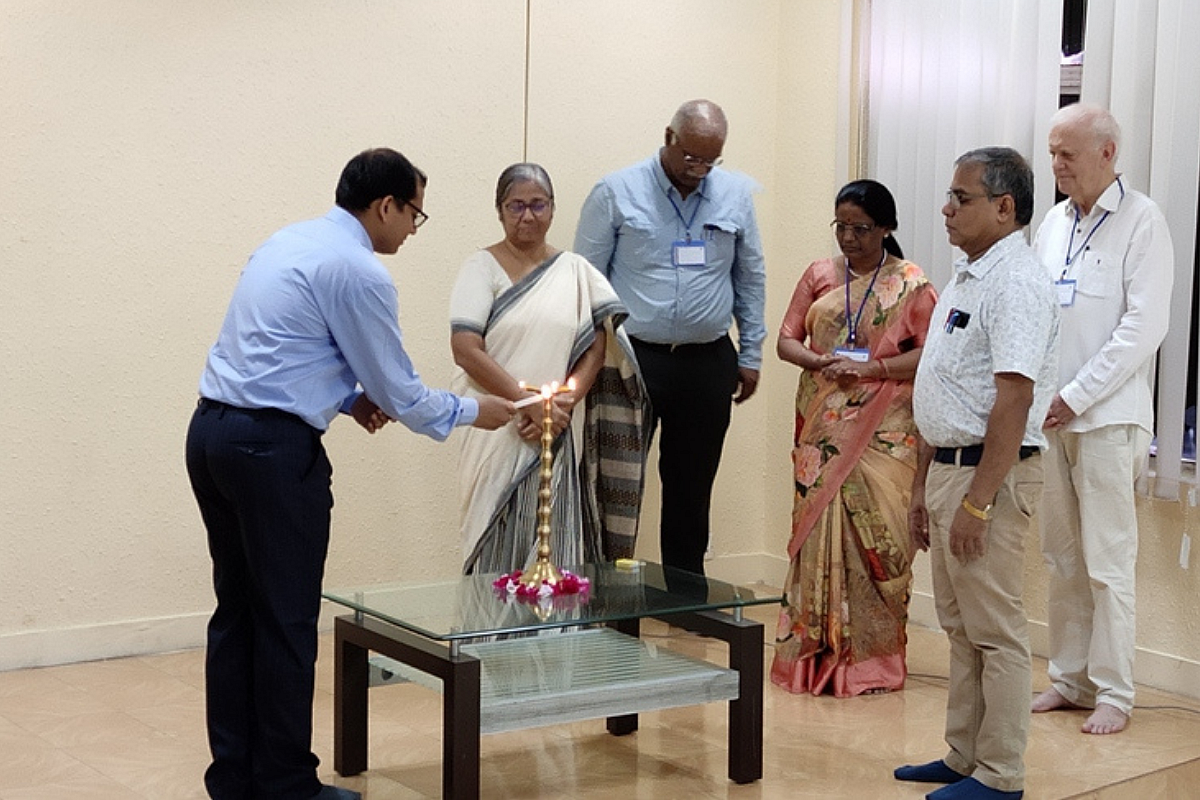 At the International Sanskrit Computational Linguistics Symposium 2019, IIT Kharagpur. Dr Pawan Goyal lights the lamp. In attendance are IIT KGP's CSE head, Prof Dipanwita Roychowdhuri, IIT Bombay's Prof Malhar Kulkarni, the University of Hyderabad's Prof Amba Kulkarni, IIT KGP's Prof P K Das, and Prof Gerard Huet of INRIA Paris.