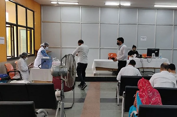 A vaccination drive for railway employees at New Delhi railway station.