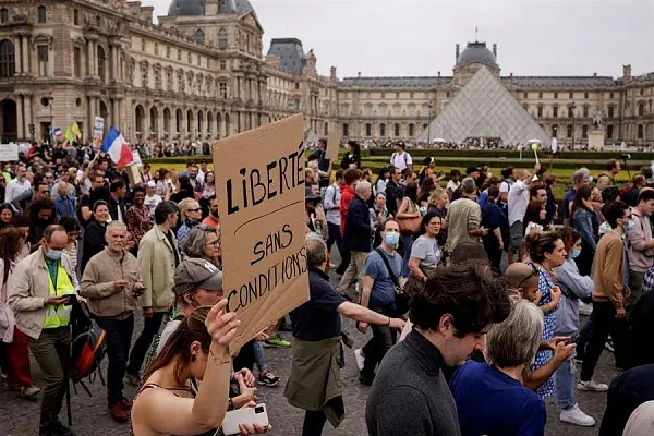 Thousands Of People From UK, Australia And France Take To Streets In Protests Against Crucial Covid-19 Measures