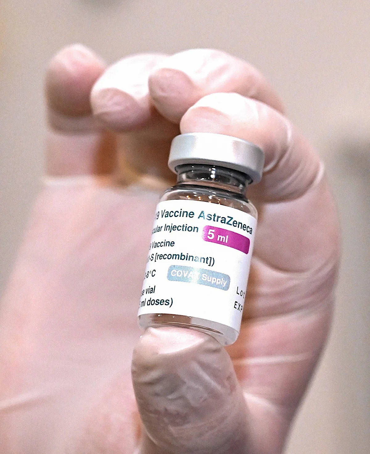 A nurse holds a vial of the Oxford-AstraZeneca vaccine against the coronavirus disease at an infectious diseases hospital in Tbilisi on March 15, 2021.