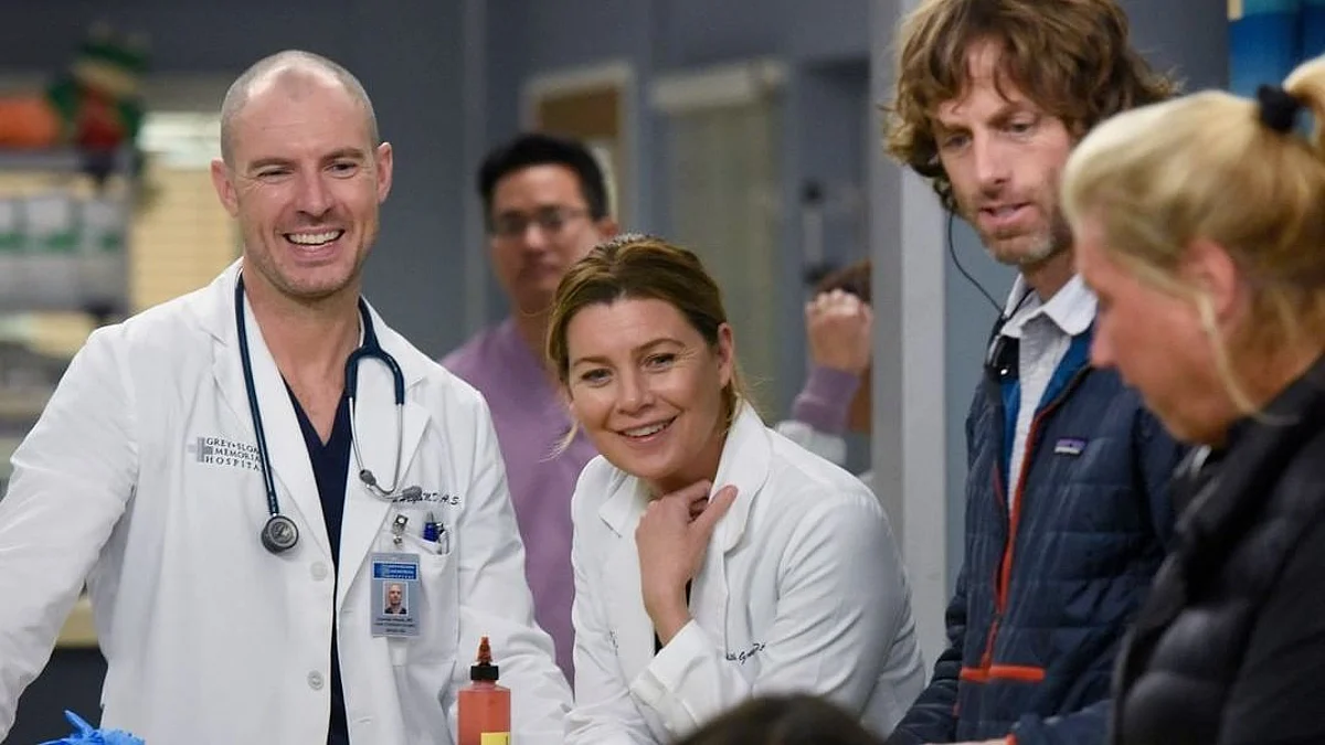 A behind-the-scenes picture from the sets of ‘Grey’s Anatomy’ featuring actors Richard Flood and Ellen Pompeo with the rest of the team