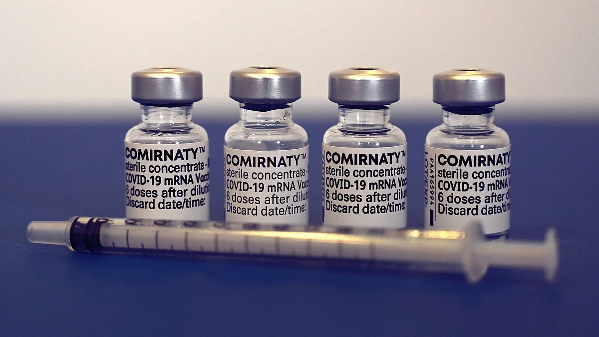 Used vials of Pfizer-BioNTech's Comirnaty COVID-19 vaccine