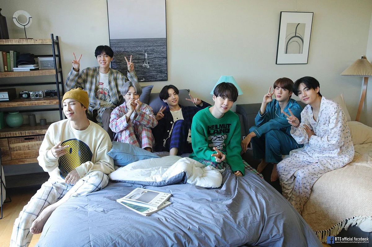 BTS posted this picture from their music video set featuring - RM, J-Hope, Jimin, Jungkook, Suga, Jin and V (L-R)