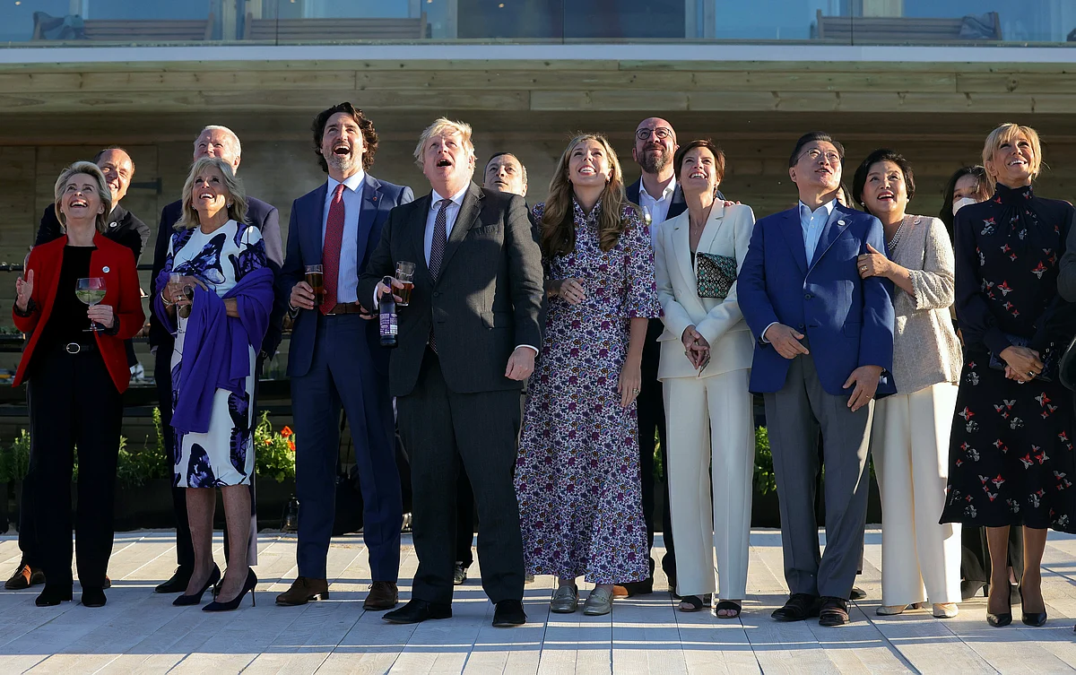 UK Prime Minister Boris Johnson with Canadian Prime Minister Justin Trudeau, President of the European Council Charles Michel, US President Joe Biden, Japanese Prime Minister Yoshihide Suga, British Prime Minister Boris Johnson, Italian Prime Minister Mario Draghi, French President Emmanuel Macron, President of the European Commission Ursula von der Leyen during a red arrow show at the G7 Summit on Saturday.