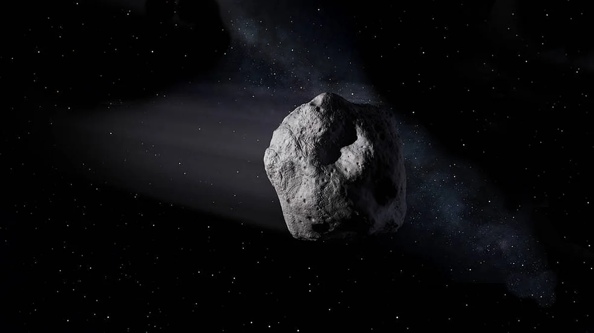 A km wide asteroid flying past earth.