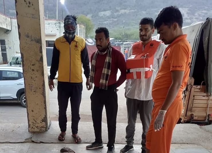 Rescue team extricating bodies of missing fishermen