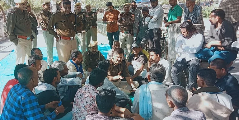 police officer with victim's family