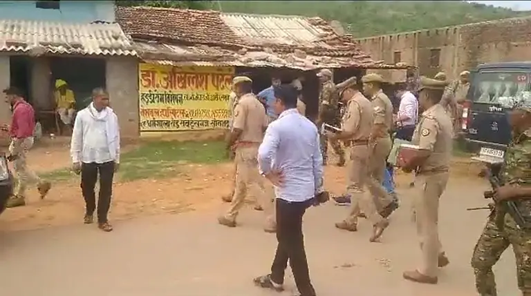 Sonbhadra. Police questioning people at the scene.