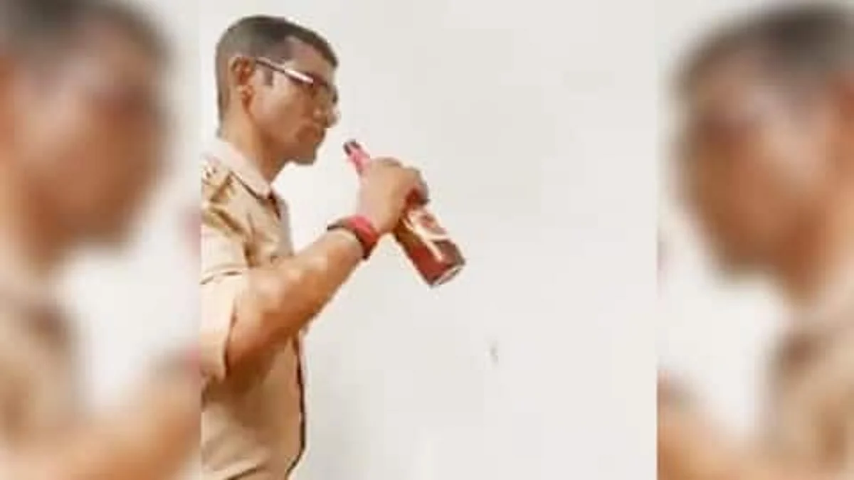 UP Police Sub-Inspector Caught On Video Drinking Beer Inside Police Station premises, Suspended