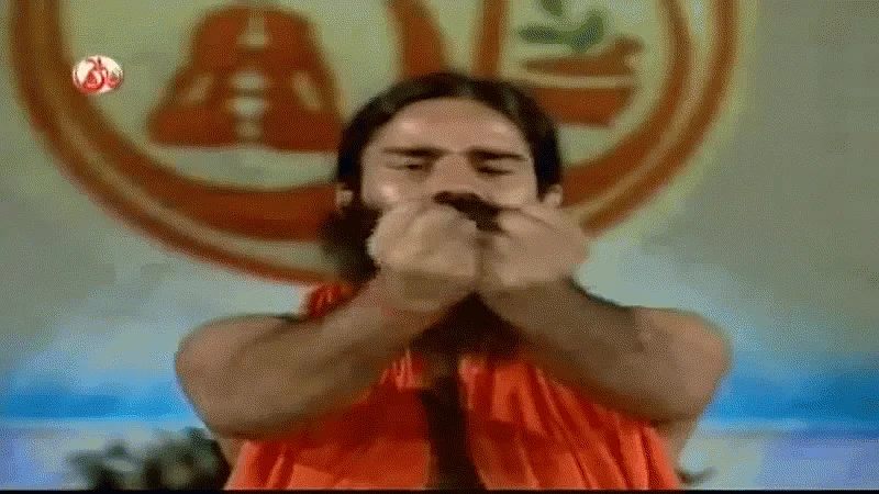 Ramdev Baba displays a light yoga exercise (Source: <a href="https://www.youtube.com/watch?v=2GT2keKrPfQ">YouTube/babaramdev</a>)