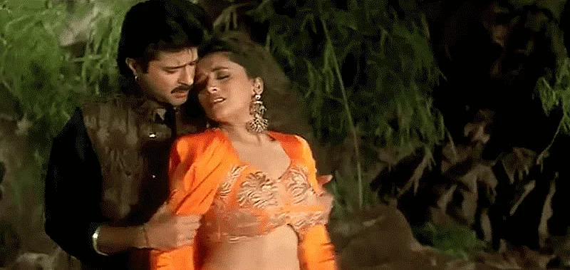 Madhuri Dixit and Anil Kapoor share a sizzling chemistry in this song <i>Dhak Dhak Karne Laga</i> (Source: <a href="https://www.youtube.com/watch?v=wEfJr5qlobk">YouTube</a>)