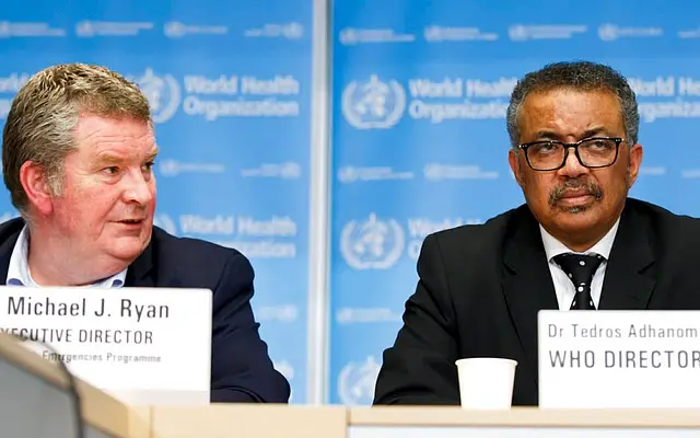 Dr Tedros Adhanom Ghebreyesus, the head of the World Health Organization (right).