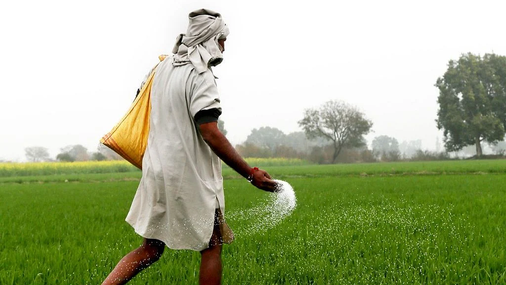 <div class="paragraphs"><p>A farm worker sprays fertilisers. (Source: iStock)</p></div>