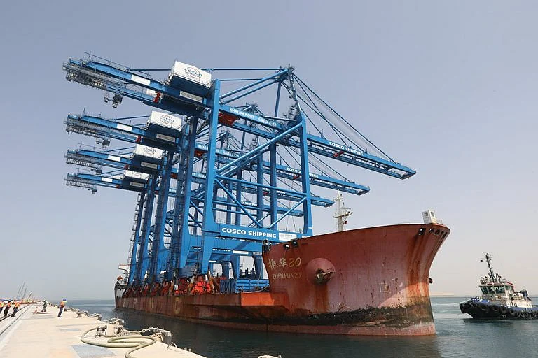 The cranes being delivered into port