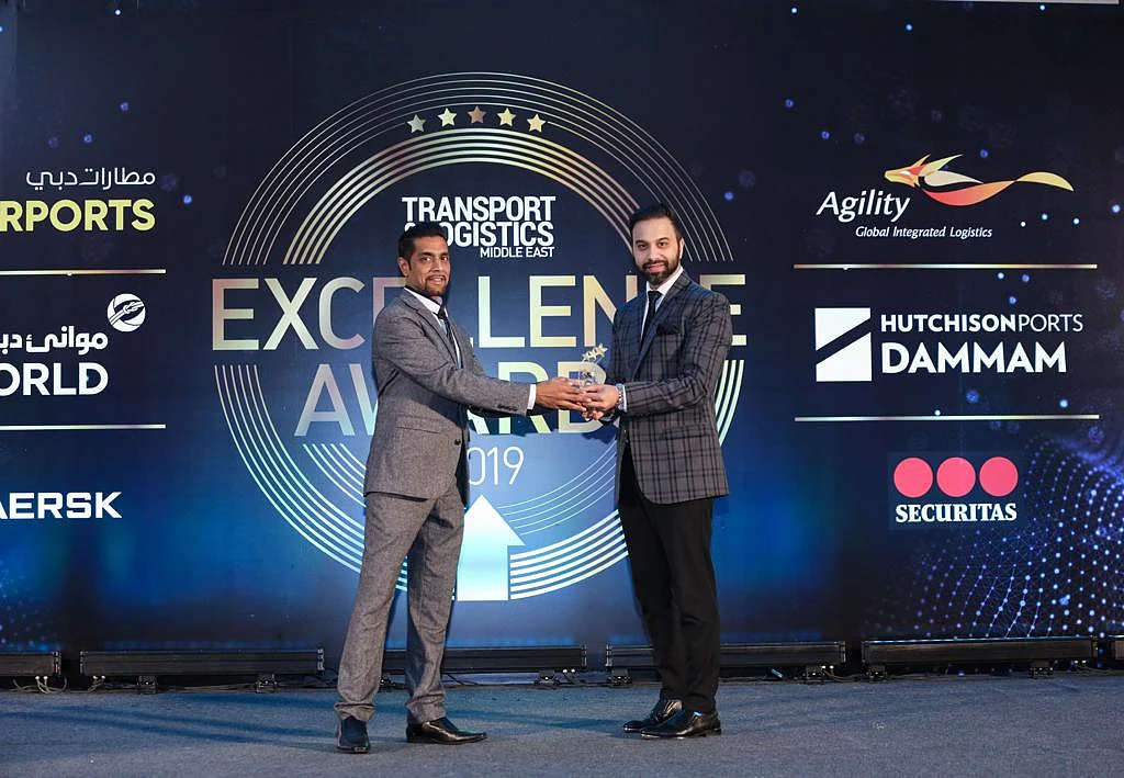 Premier Logistics receiving the award